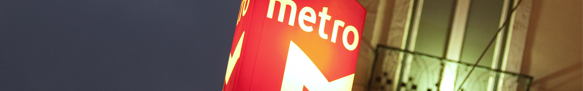 Banner - Logotipo do Metro sobre a cidade